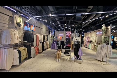 Interior of Footasylum store, Lakeside Shopping Centre, showing womenswear on display